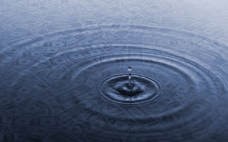 Image of drop of water in pool with dollars