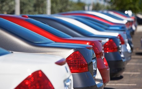 Image of a row of new cars