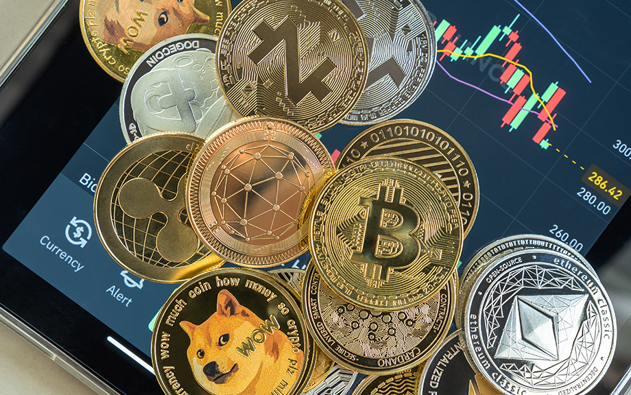 Decorative: Cryptocurrency on top of screen of trading app, Bitcoin BTC with altcoin digital coin crypto currency, BNB, Ethereum, Dogecoin, Cardano, defi p2p decentralized fintech market