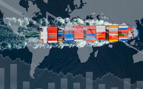Decorative image: Global map with cargo ship and bar chart