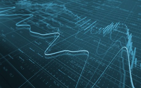 decorative photo of line and bar chart over data
