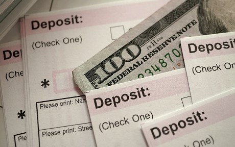 decorative image: close up shot of bank deposit slip
