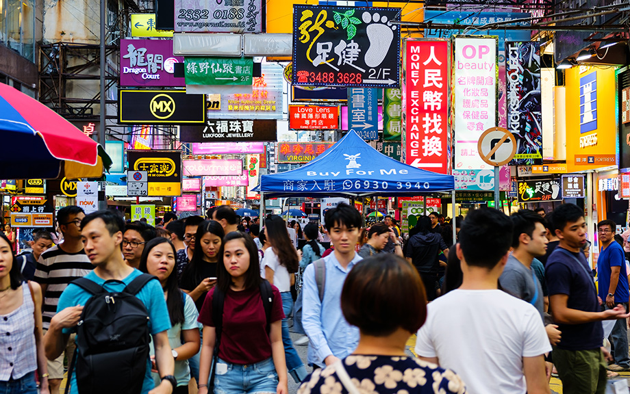 Chinese people shopping on the crowded streets of HongKong
