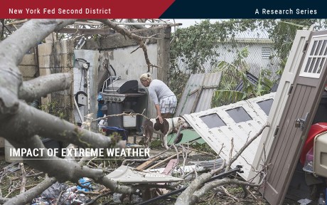 Woman looking over the debris left by hurricane of her home in Puerto Rico.