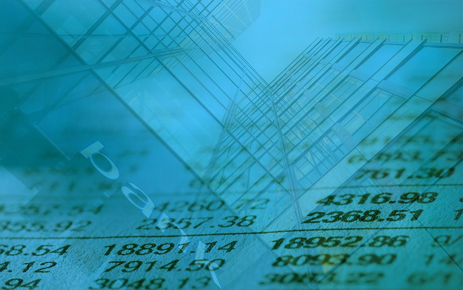 Decorative photo of tall buildings with bank sign and spreadsheet overlay.
