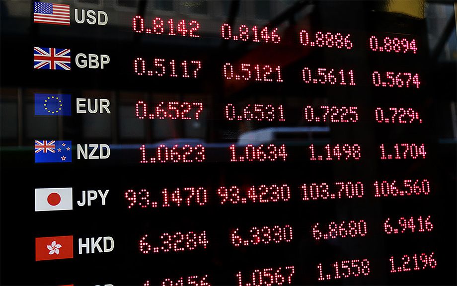 Decorative photo of a currency exchange board with prices listed.