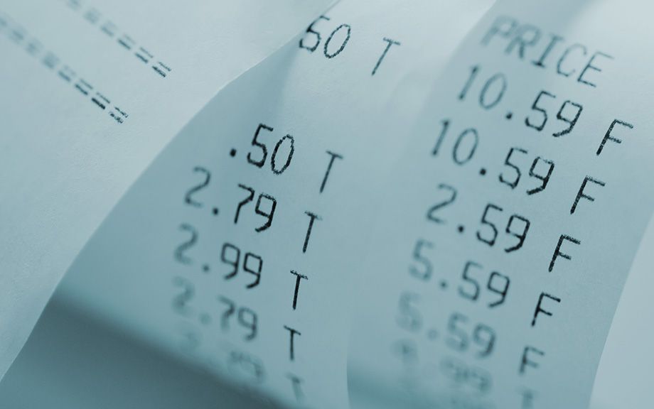 decorative photo: curled up shopping receipt with the word price at that top.