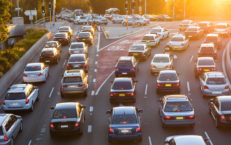 photo of traffic with cars stretching into the distance.