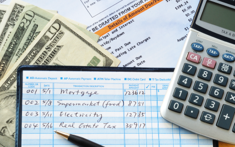 Image: Write some checks to make payments for household expenses