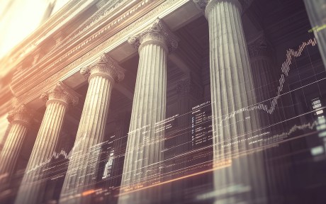 Designing Bank Regulation with Accounting Discretion Financial stability: A classic bank building with columns, financial symbols, and charts, representing the concept of financial stability and security.